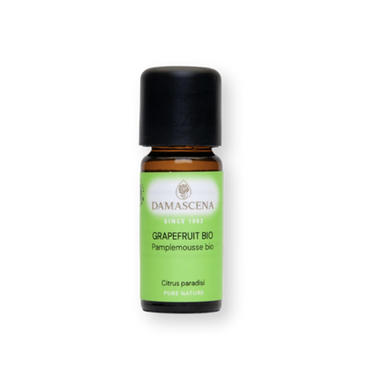 Kleines braunes Fläschchen mit grünem Aromaveda "Grapefruit Bio" Etikett
